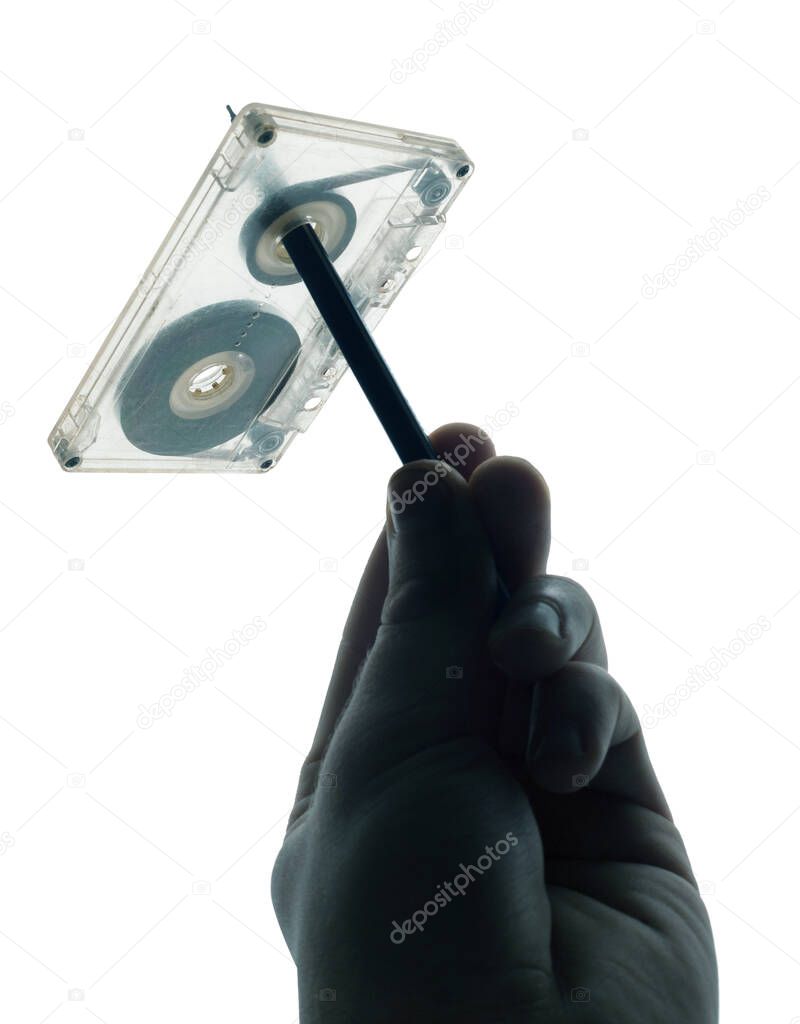 Rewind tape on cassette isolated on white background.