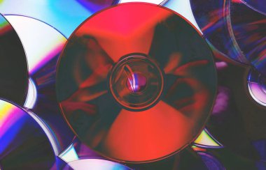 CD disk arkaplanı. Sıkıştırılmış disk koleksiyonu dekorasyonu.
