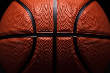 Basketball rubber orange ball close-up texture background. clipart