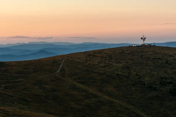 Top opakovač hory západ slunce — Stock fotografie