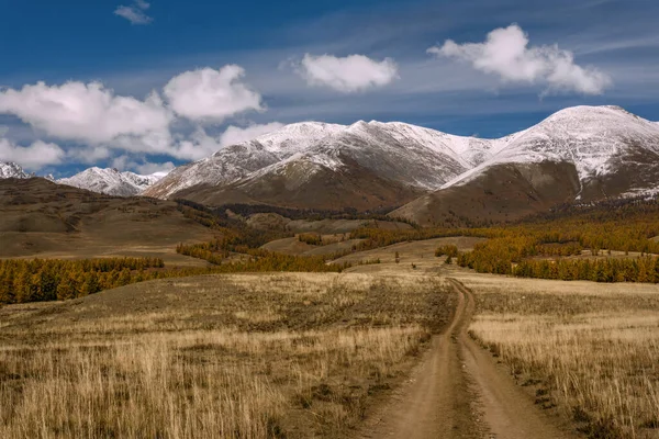 Amazing Autumn Landscape Winding Dirt Road Mountains Covered Snow Forest — Stock Photo, Image