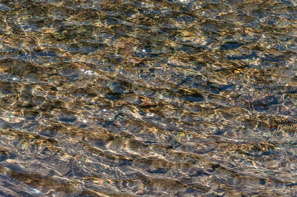 Water waves stones texture — Stock Photo, Image