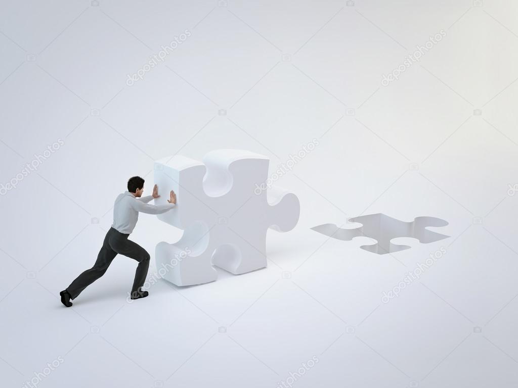 Businessman push puzzle