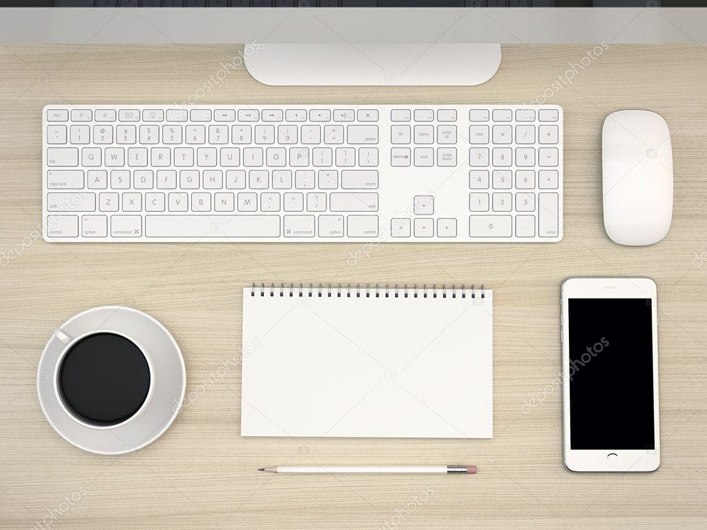 White Office table with computer ans smartphone.