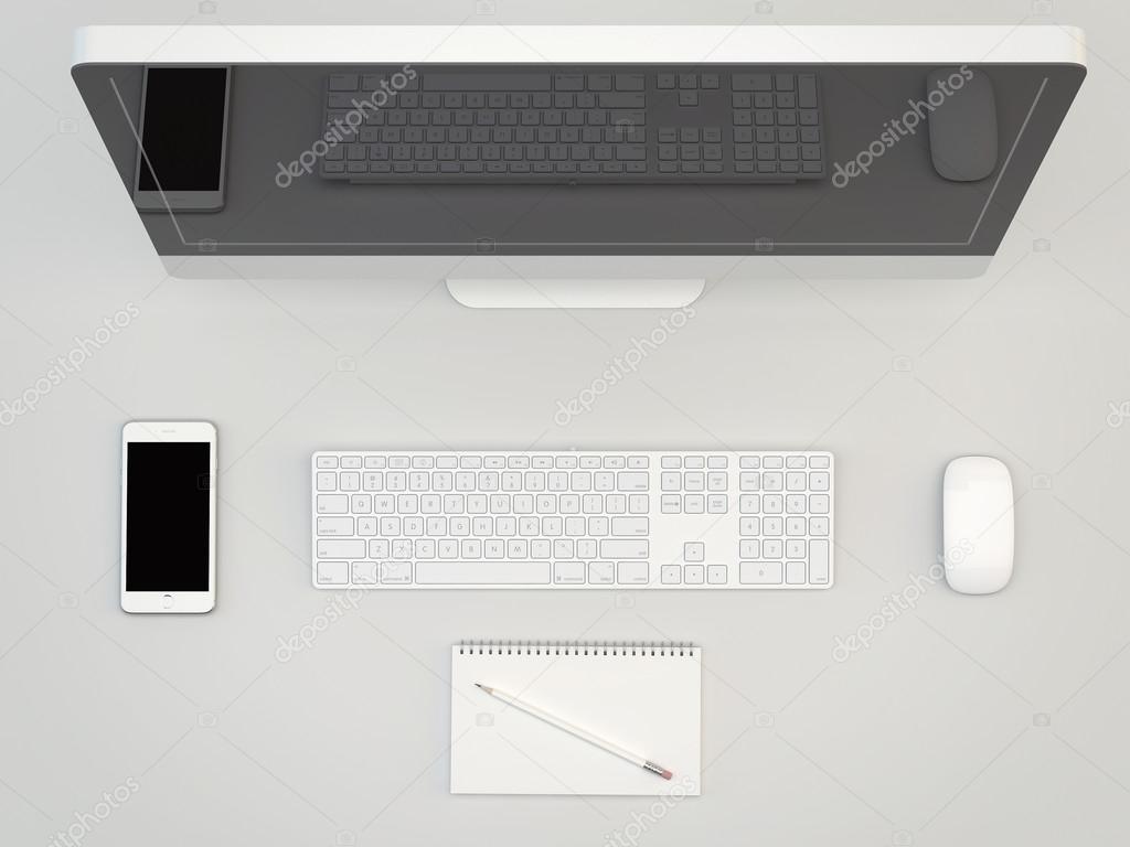 White Office table with computer ans smartphone