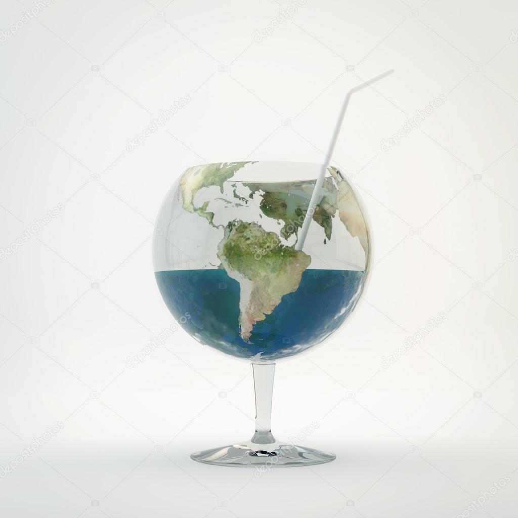 Glass with water in form of planet earth.