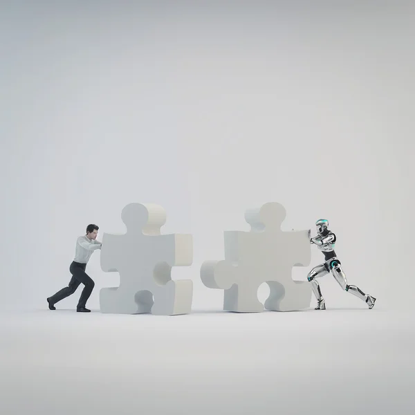 Robot y hombre de negocios empujaron parte del rompecabezas . — Foto de Stock