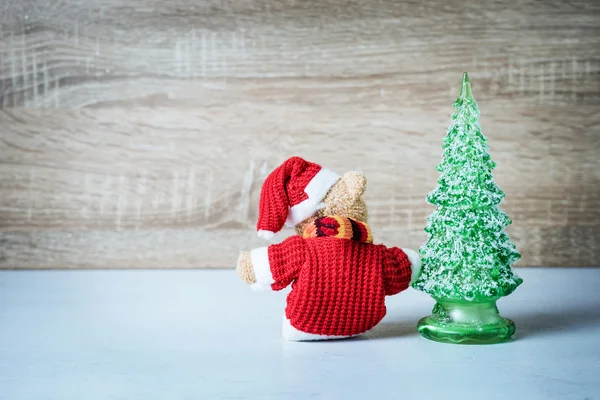 Christmas decoration Teddy Bear and christmas tree on wooden bac — Stock Photo, Image