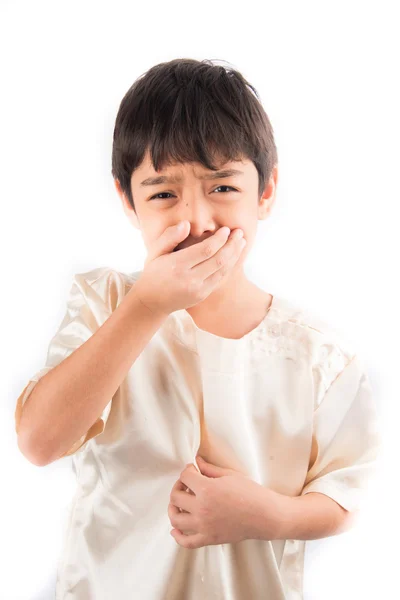 Pequeño chico cierra la nariz con cara infeliz — Foto de Stock