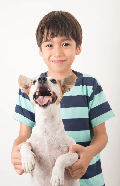 Little boy playing with his friend dog jack russel — Stock Photo, Image