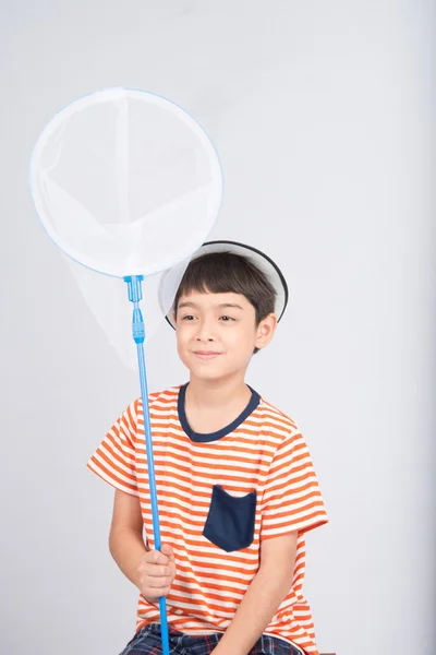 Chlapeček s moskytiérou na bílém pozadí — Stock fotografie