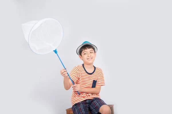 Little boy taking insect net on white background — Stock Photo, Image