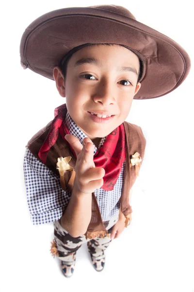 Menino em traje de cowboy no fundo branco — Fotografia de Stock