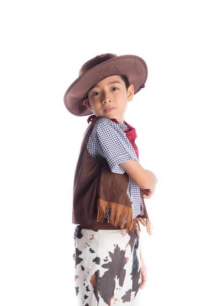 Menino em traje de cowboy no fundo branco — Fotografia de Stock