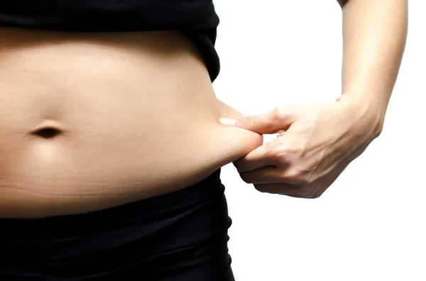 Fat female belly holding or pinching fat on white background — Stock Photo, Image