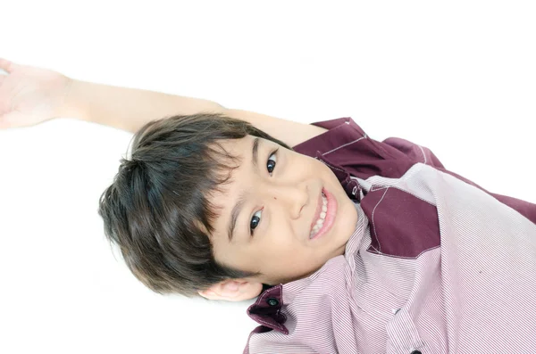 Kleine jongen vaststelling op verdieping op witte achtergrond — Stockfoto