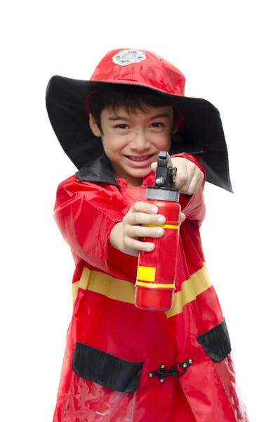 Pequeño niño fingir como un bombero sobre fondo blanco — Foto de Stock