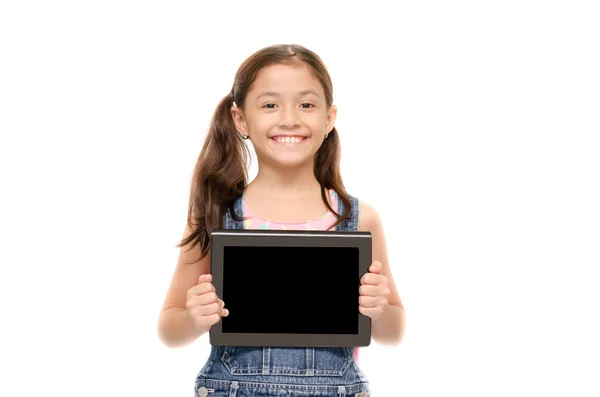 Menina segurando tablet no fundo branco — Fotografia de Stock