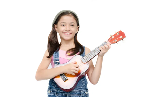 Little girl playing ukulele on white background — Stock Photo, Image