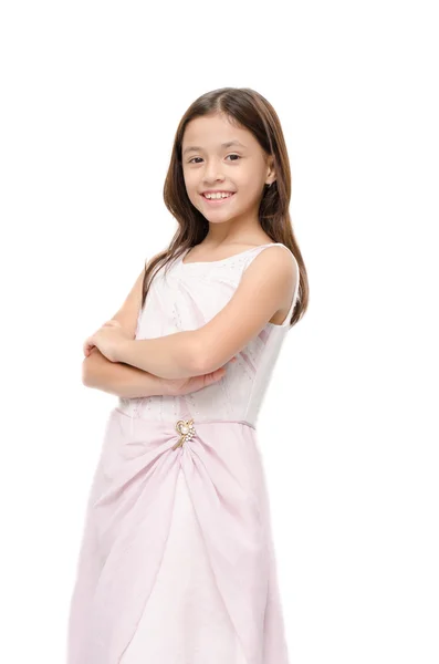 Retrato de niña sobre vestido rosa sonriendo sobre fondo blanco —  Fotos de Stock
