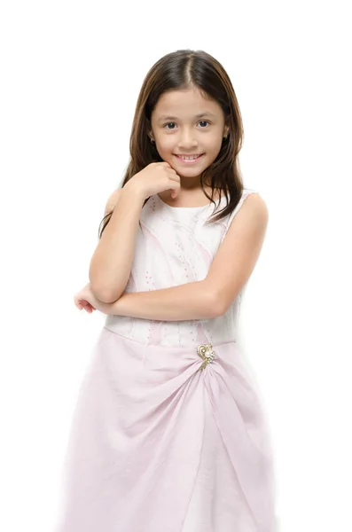 微笑在白色背景上的粉红色裙子的小女孩肖像 — 图库照片