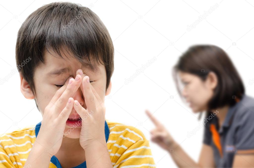 Mother teaching her crying son on white background