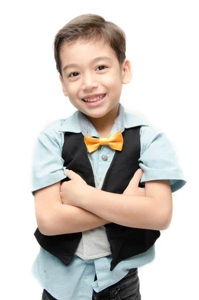 Liten pojke i kostym holding blackboard på vit bakgrund — Stockfoto