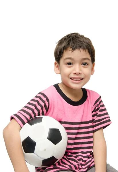 Mały chłopiec posiadania piłki nożnej na białym tle — Zdjęcie stockowe