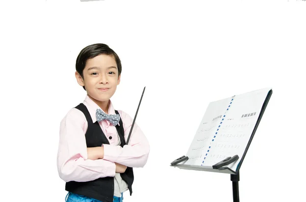 Pequeño niño pretender como conductor líder sobre fondo blanco — Foto de Stock