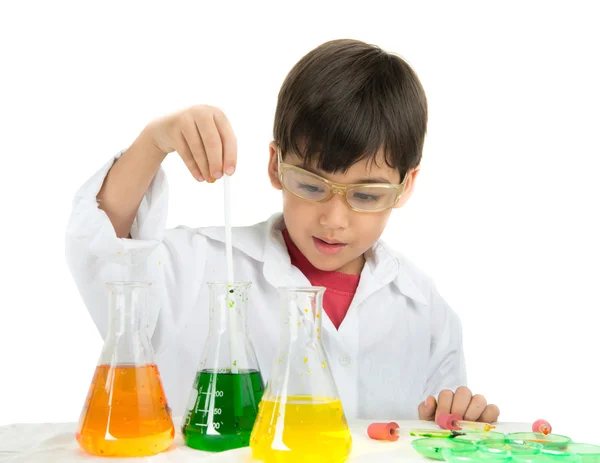 Little boy learning in chemecal in science in class Royalty Free Stock Images