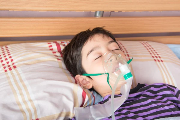 Little boy using Respirator for help breathing — Stock Photo, Image