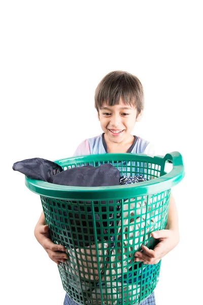 Niño tomando cesta de paños sucios para lavar — Foto de Stock