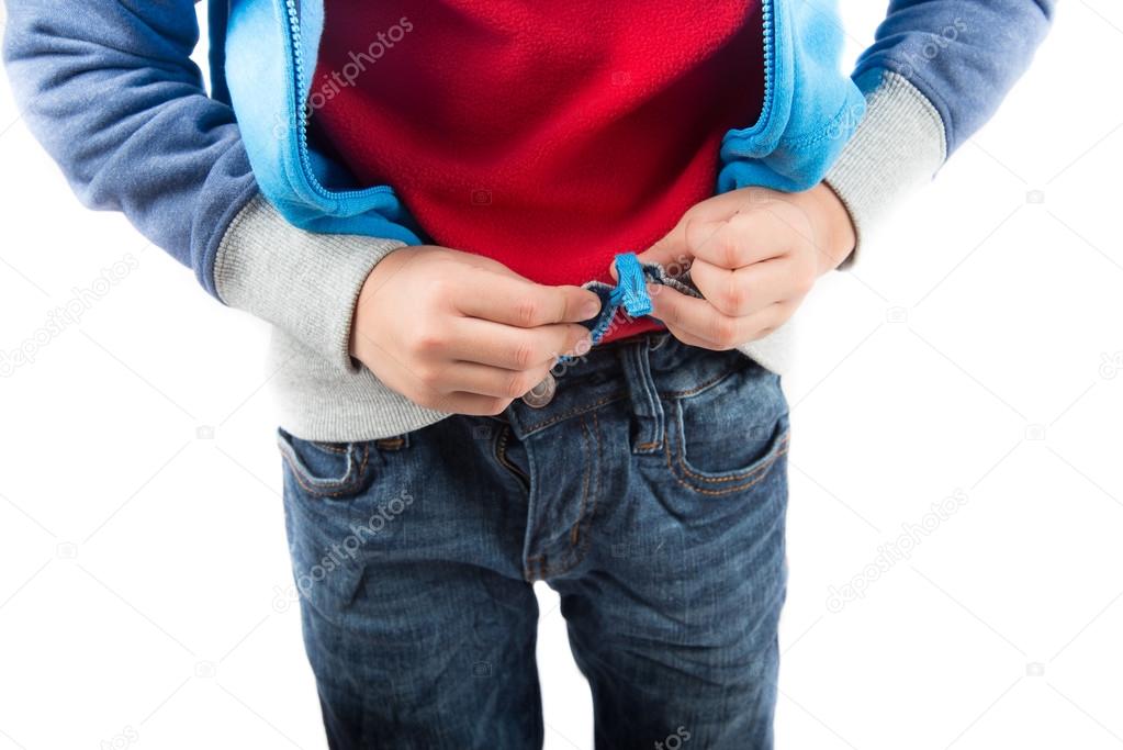 Little ooy trying cloth his zipper on sweate