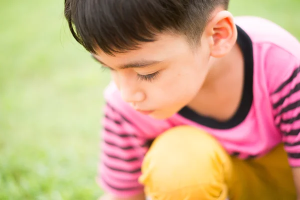 Little boy sitting alone close up solfly — Stock Photo, Image