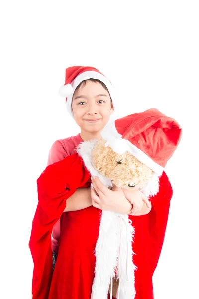 Liten pojke tar ger finns på jul — Stockfoto