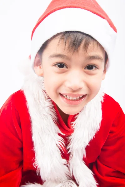 Mały chłopiec w santa claus Boże Narodzenie czerwony tkaniny — Zdjęcie stockowe