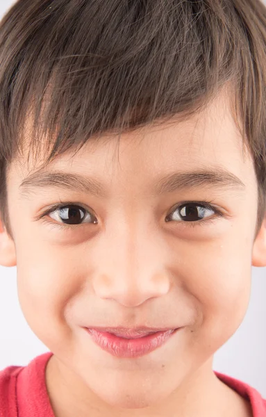 Fechar o rosto com o retrato de criança sorridente — Fotografia de Stock