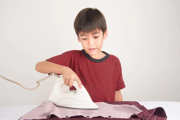 Little boy ironing house work — Stock Photo, Image