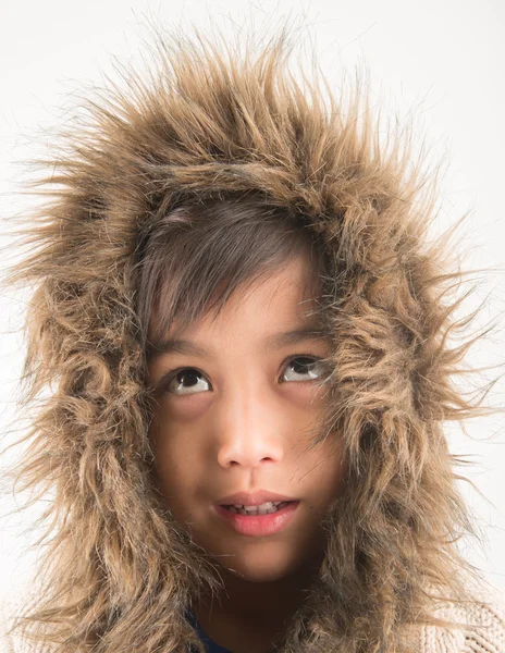 Little boy wearing fur coat protect from cold Stock Image