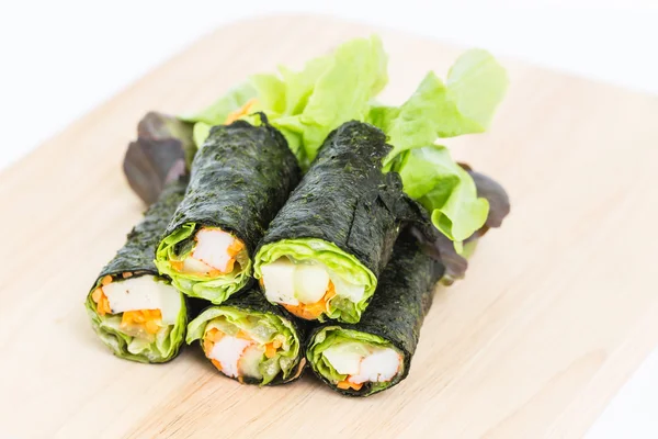 Fresh vegetable wrapped with seaweed sheet — Stock Photo, Image