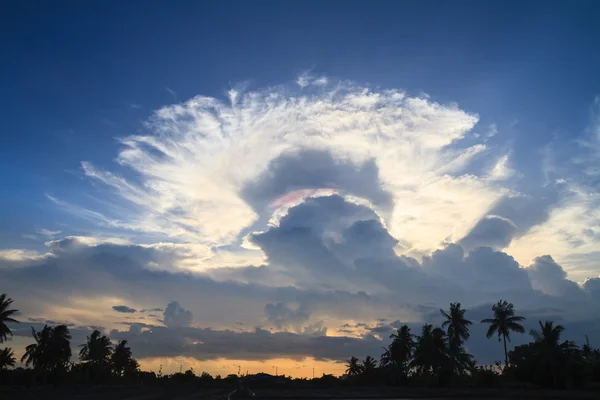 Rainbow in between two clouds gap — Stock Photo, Image