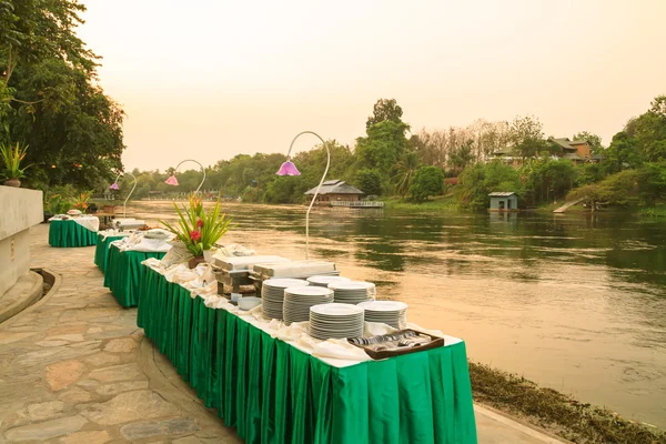 Prepared dishes and food for the party at riverside — Stock Photo, Image