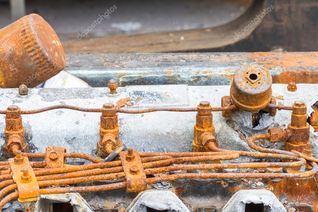 Old rusty injector and fuel pipe of diesel engine