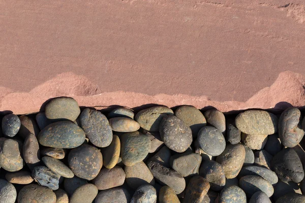 Pebble stones and sand stone background — Stock Photo, Image