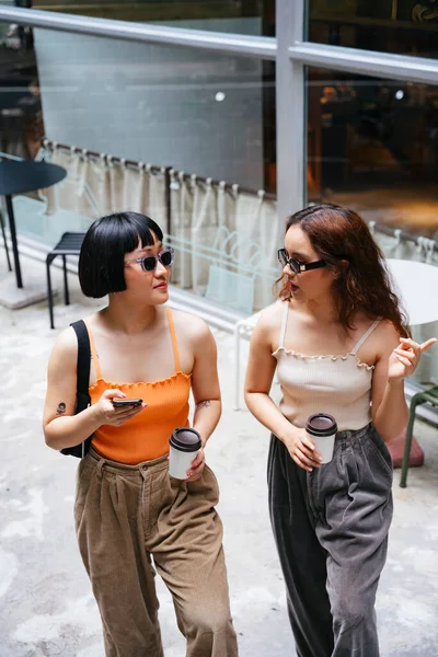Two Young Asian Girls Wear Sunglasses Holding Cup Coffee Walking — Stock Photo, Image
