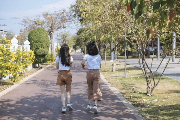 Two Girls White Shirt Jogging Running Path Public Park — Stock Photo, Image