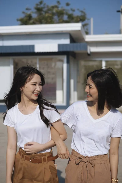 people with interlocked arms people with interlocked arms