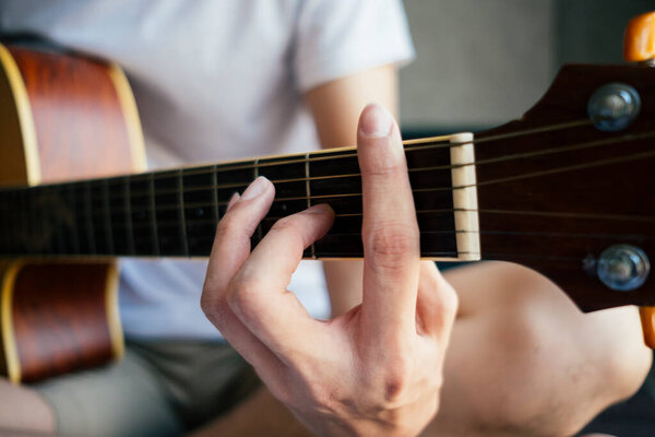 Close Young Guitarist Hand Playing Acoustic Guitar Stock Picture