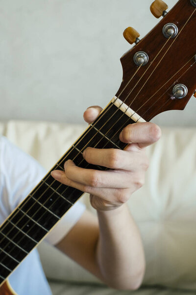 Close Guitarist Fingers Playing Acoustic Guitar Stock Picture