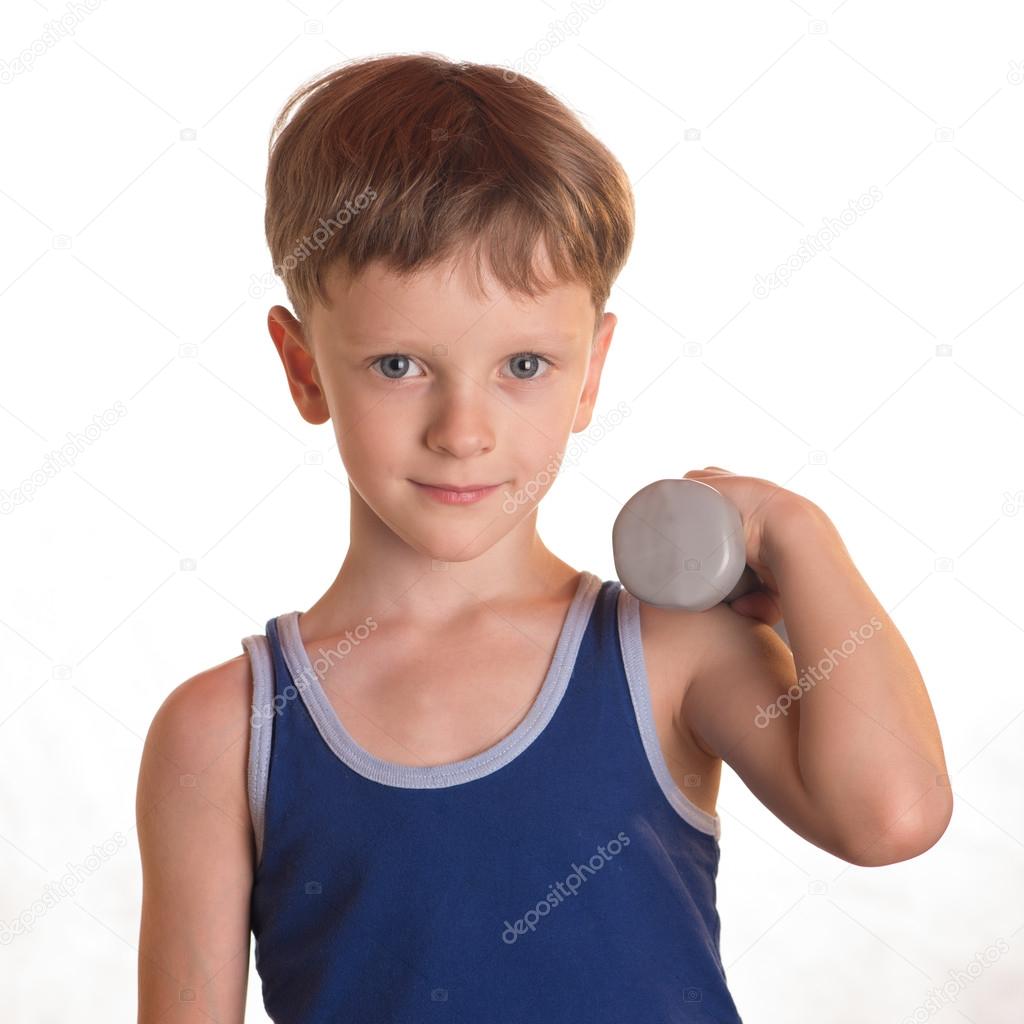 Boy blue shirt doing exercises with dumbbells over white backgro